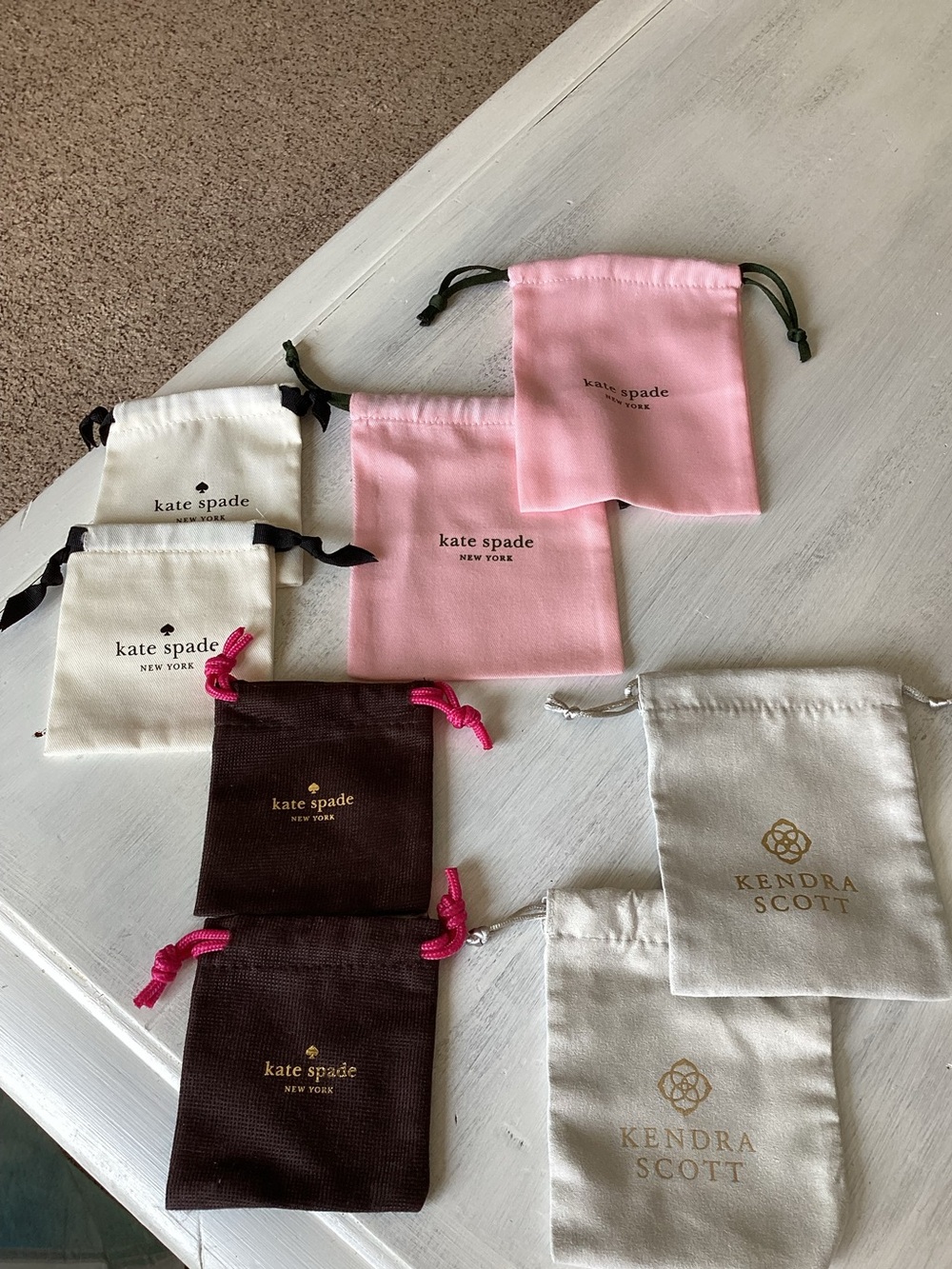 kate spade Brown Pouch with Pink Drawstrings